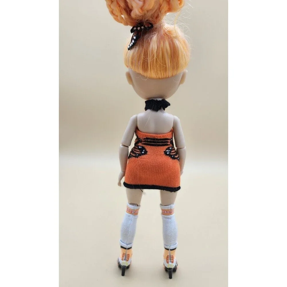 Rainbow High Junior Poppy Rowan Orange Fashion Doll Butterfly Monarch Bow